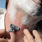 Man Shaving With Razor Burn or folliculitis
